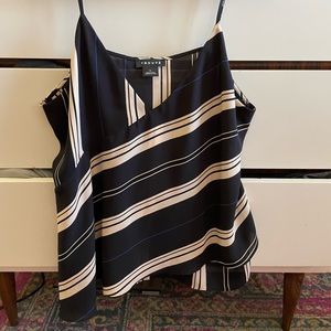 Asymmetrical striped navy and white tank. XL